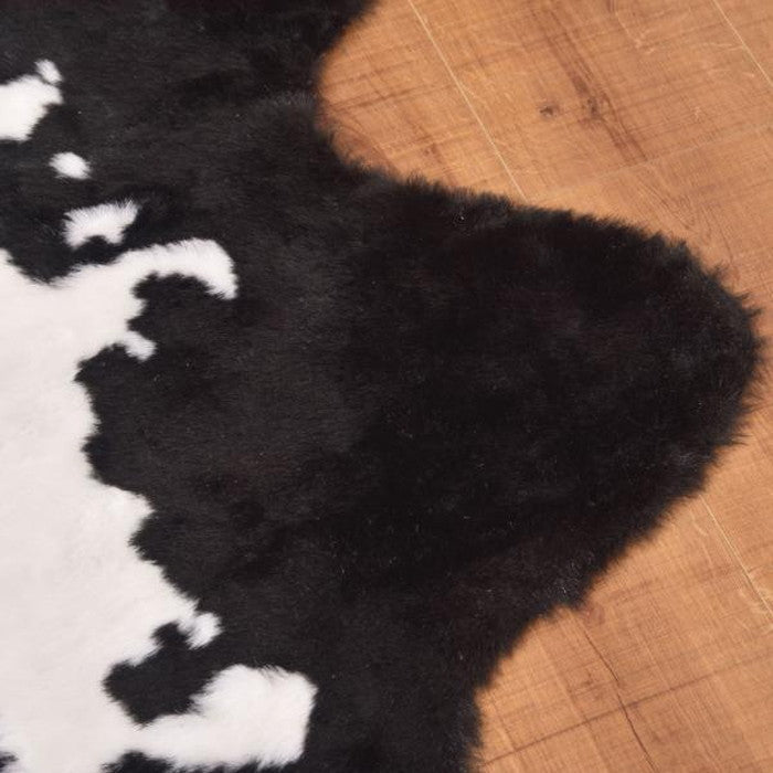 ラグ マット ブラック ブラウン 約W160×D220 マット ラグ ウシ ジャングル アニマル柄 牛柄 牛柄調 オシャレ ラグマット デザインラグ アフリカンパング フェイクカウハイド調 ブラック 牛柄ラグ アニマルラグ azu-rg-15の画像